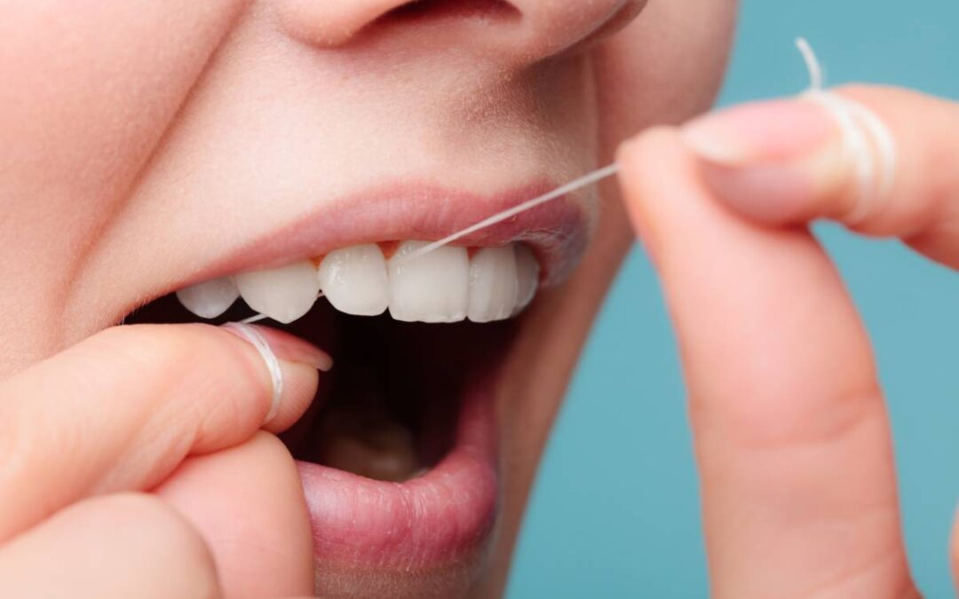 featured image for tips for flossing with dental implants